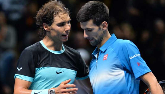 Rafael Nadal (L) and Novak Djokovic. — AFP
