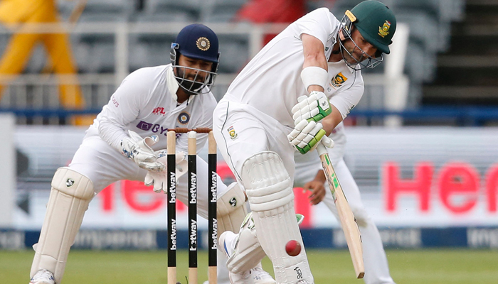 South Africas Dean Elgar (R) plays a shot that leads to South Africa winning the second Test cricket match between South Africa and India at The Wanderers Stadium in Johannesburg on January 6, 2022 .— Photo by Phill Magakoe/AFP