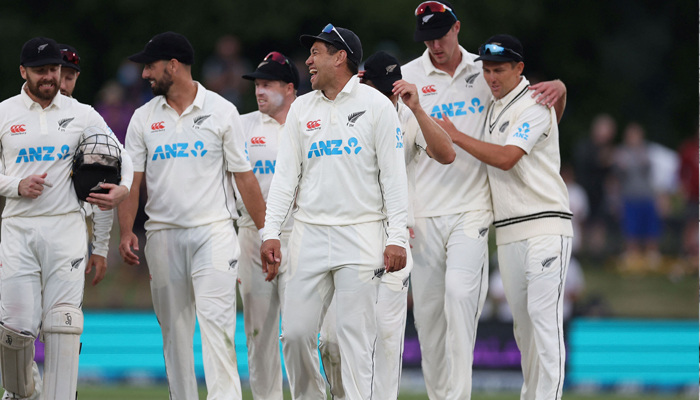 New Zealand´s Ross Taylor (C) celebrates with teammates after Bangladesh´s Ebadot Hossain was caught out during day three of the second cricket Test match between New Zealand and Bangladesh in Christchurch on January 11, 2022. — AFP