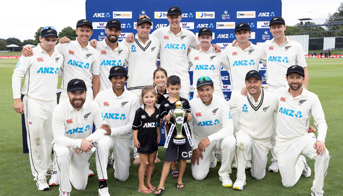 New Zealand pose for a team photo at end end of day three of the second cricket Test match between New Zealand and Bangladesh in Christchurch on January 11, 2022. (Photo by Marty MELVILLE / AFP)