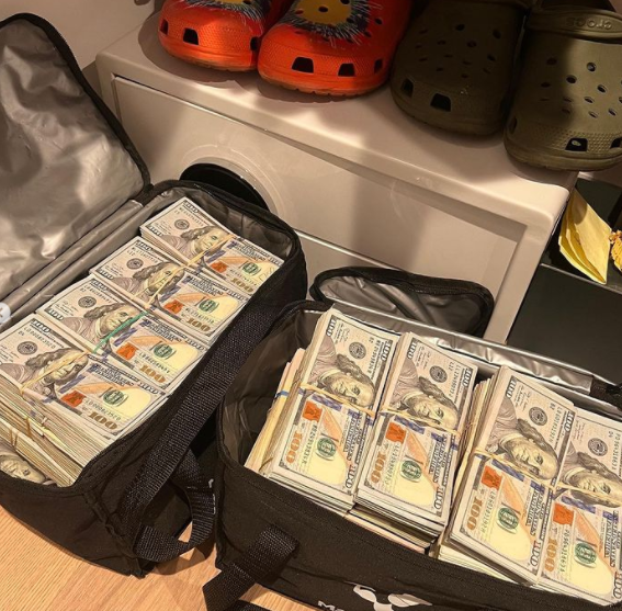 Drake proves he’s a certified millionaire with a glimpse into piled-up stacks of cash