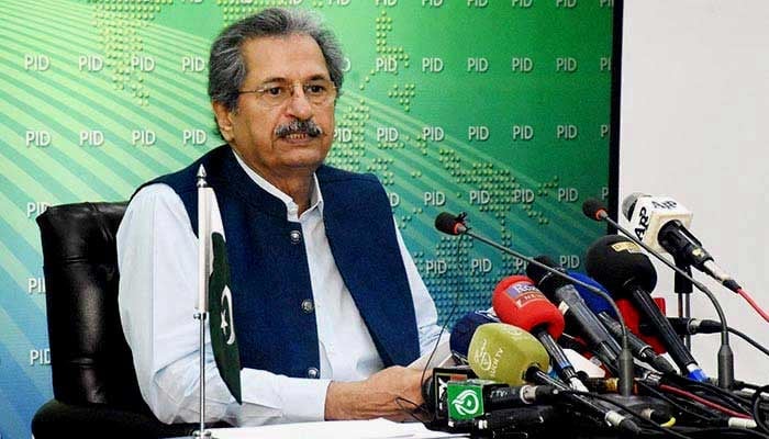 Minister for Federal Education and Professional Training Shafqat Mehmood addressing a press conference  — PID/ File