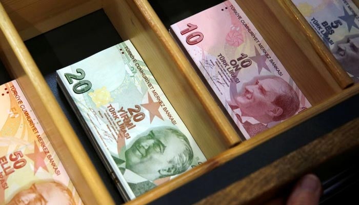 Turkish lira banknotes are pictured at a currency exchange office in Istanbul, Turkey August 13, 2018.— Reuters/File