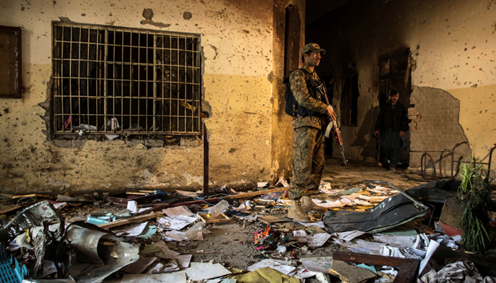 An army soldier stands inside the Army Public School, which was attacked by Taliban gunmen, in Peshawar, December 17, 2014. — Reuters/File
