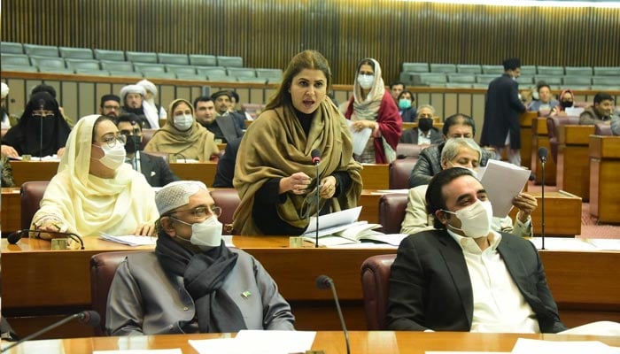Former president Asif Ali Zardari (L) and PPP Chairman Bilawal Bhutto-Zardari can be seen sitting in the front row of the National Assembly during a session on January 13, 2022. — Twitter/NAofPakistan