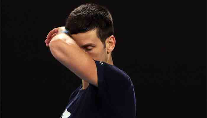 Novak Djokovic of Serbia attends a practice session ahead of the Australian Open tennis tournament in Melbourne on January 14, 2022.-AFP