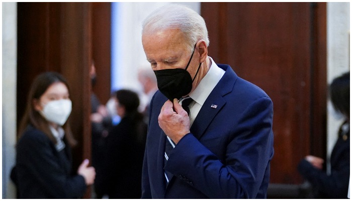 US President Joe Biden departs after meeting with Senate Democrats to make a personal plea to unify and pass voting rights legislation, on Capitol Hill in Washington, U.S., January 13, 2022. REUTERS/Kevin Lamarque