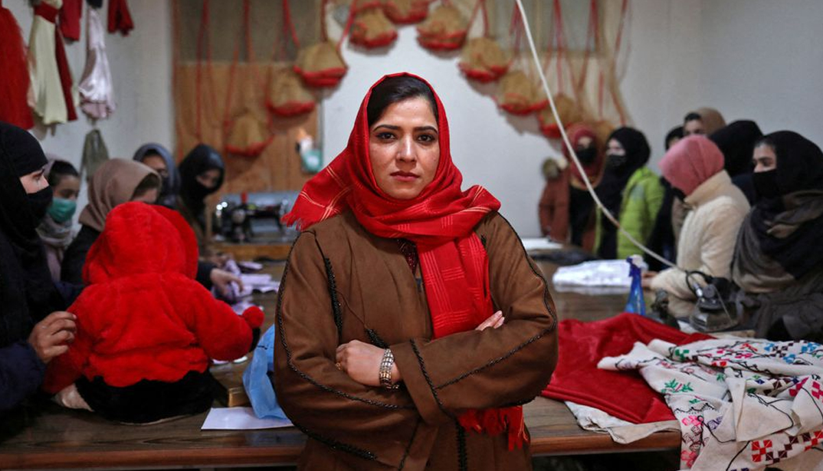 Sohaila Noori, 29, owner of a sewing workshop, poses at her workshop in Kabul, Afghanistan January 15, 2022. — Reuters