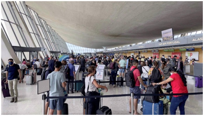 Passengers at Dulles Washington International Airport (IAD) in Dulles, Virginia. — AFP