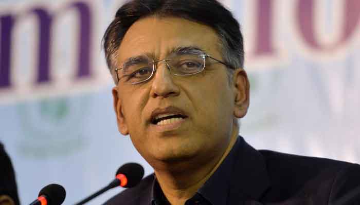 Federal Minister for Planning, Development, and Special Initiatives Asad Umar speaks during an event — AFP