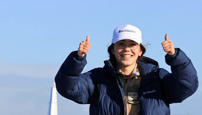 Belgian-British pilot Zara Rutherford, 19, gestures following her landing at Kortrijk-Wevelgem Airport, after a round-the-world trip in a light aircraft, becoming the youngest female pilot to circle the planet alone, in Wevelgem, Belgium, January 20, 2022. REUTERS/Pascal Rossignol/File