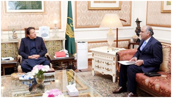 Prime Minister Imran Khan (L) and Syed Tariq Mahmood-ul-Hassan (R). — Provided by author