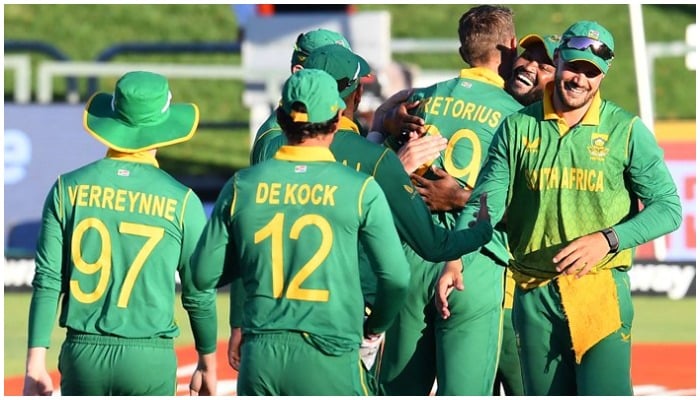 South Africas cricketers celebrate after victory in the third one-day international (ODI) cricket match between South Africa and India at Newlands Stadium in Cape Town on January 23, 2022. — Photo by Rodger Bosch/AFP