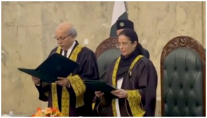 CJP Gulzar Ahmed (left) administers oath to Justice Ayesha Malik (right) at the Supreme Court building in Islamabad on January 24, 2021. — Facebook