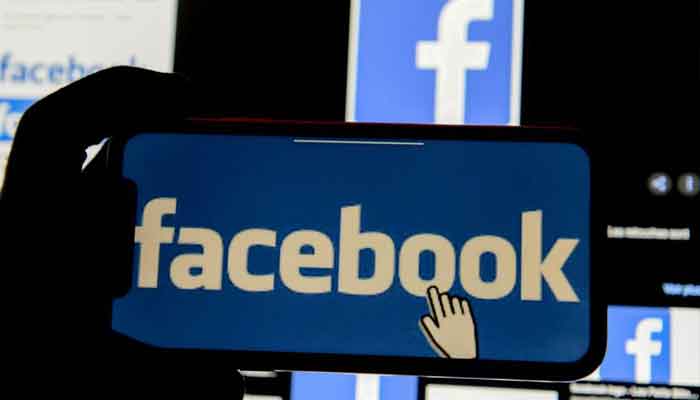 The Facebook logo is displayed on a mobile phone in this picture illustration taken December 2, 2019. — Reuters/File