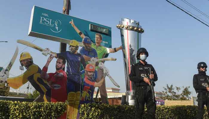 Policemen stand guard outside the National Cricket Stadium in Karachi on January 26, 2022, ahead of the Pakistan Super League (PSL) T20 cricket match between the Karachi Kings and Multan Sultans. — AFP