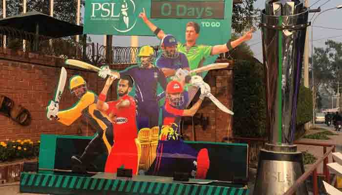 PSL promotional boards and a model of PSL trophy propped up outside PCB building.Photo: Sohail Imran