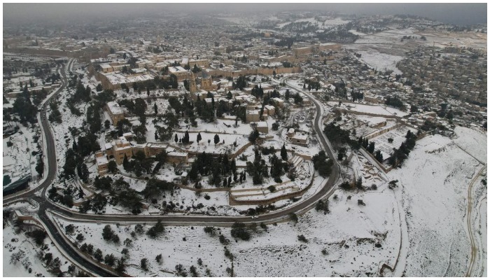 An aerial view shows Jerusalems Old City covered in snow, January 27, 2022. Photo: Reuters