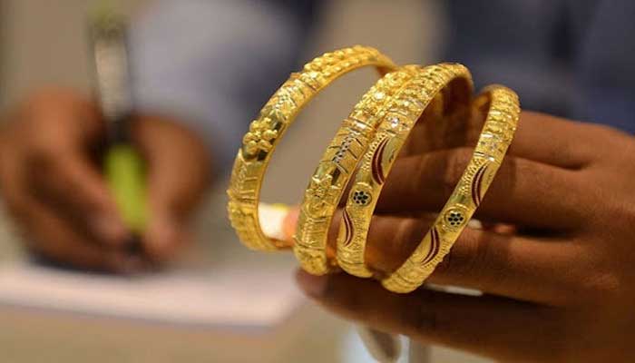 Gold bangles. — AFP/File