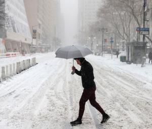 'One for the record books': US East Coast blanketed in snow