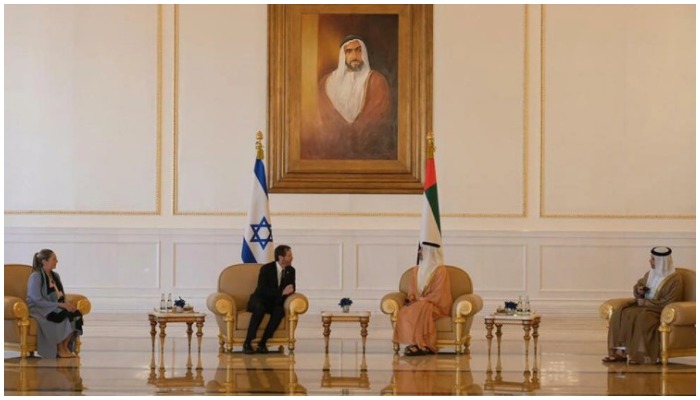 Israels President Isaac Herzog, seated second from the left, joined by First Lady Michal, meets UAE Foreign Minister Sheikh Abdullah bin Zayed Al-Nahyan Amos Ben — Gershom GPO/AFP