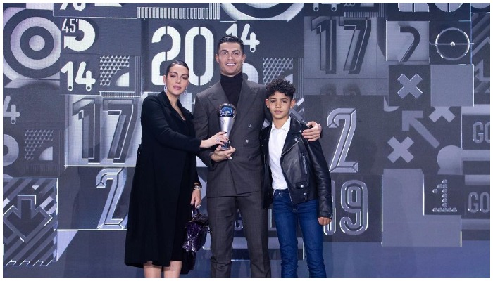 Cristiano Ronaldo posing with girlfriendGeorgina Rodriguez and son Cristiano Jr. — Instagram/cristiano