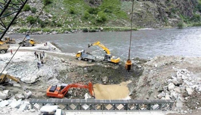 Image showing work in progress at the dam site of Kishanganga power project. Photo: Reuters