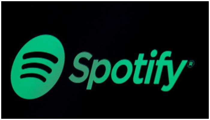 The Spotify logo is displayed on a screen on the floor of the New York Stock Exchange (NYSE) in New York, U.S., May 3, 2018. Photo: Reuters