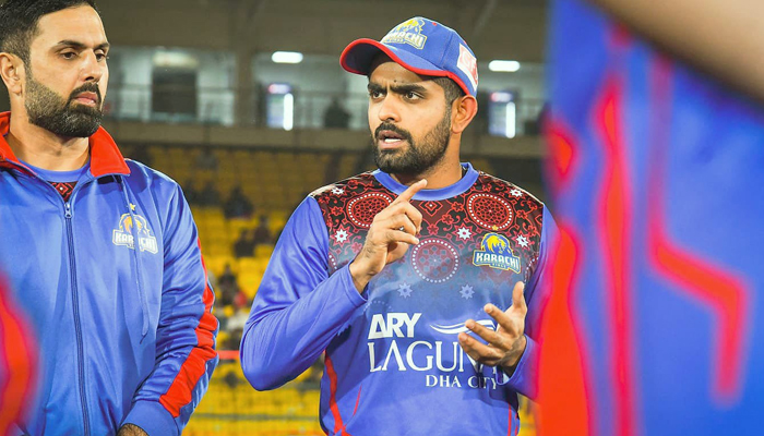 Babar Azam speaks to his Karachi Kings teammates. — Twitter/babarazam258