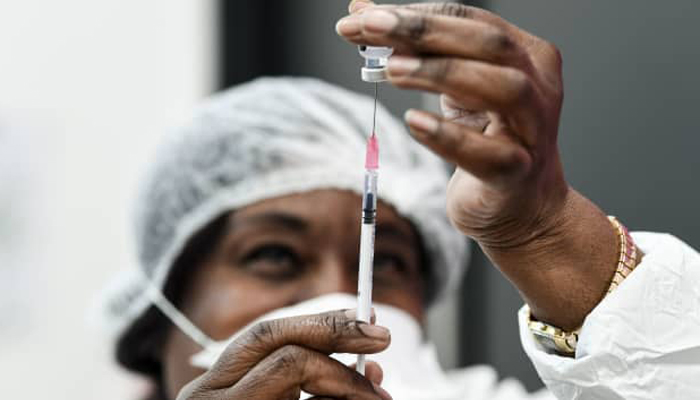 A nurse prepares the Pfizer-BioNTech COVID-19 vaccine, at a vaccination center, in Sarcelles near Paris on January 10, 2021. &mdash; AFP/File
