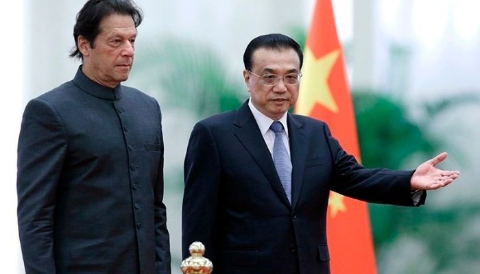 Prime Minister Imran Khan and Chinas Premier Li Keqiang attend a welcome ceremony at the Great Hall of the People in Beijing in 2018.—AFP