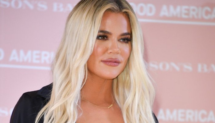 Khloé Kardashian flaunts her back muscles in before-and-after photos