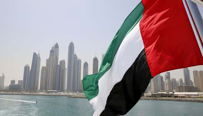 UAE flag flies over a boat at Dubai Marina, Dubai, United Arab Emirates May 22, 2015. — Reuters/File