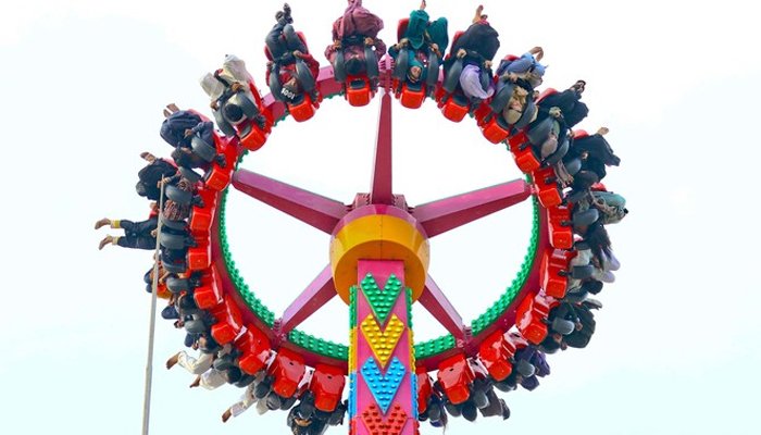 People can be seen enjoying a ride at Askari Amusement Park in Karachi. — Park management