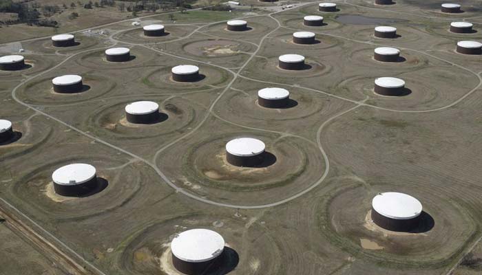 Crude oil storage tanks are seen from above at the Cushing oil hub, in Cushing, Oklahoma, March 24, 2016.  — Reuters/File