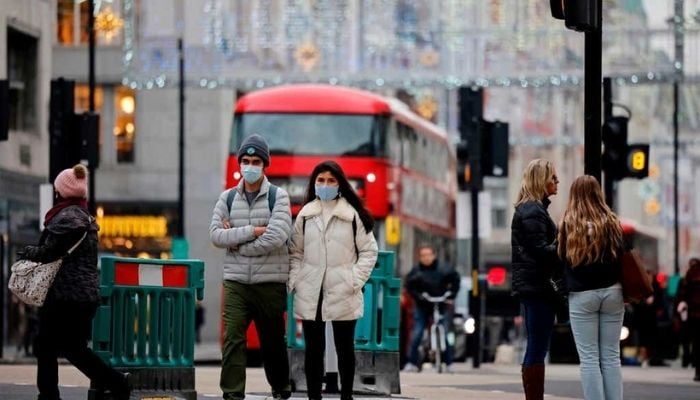 Pedestrians in London. Photo: AFP