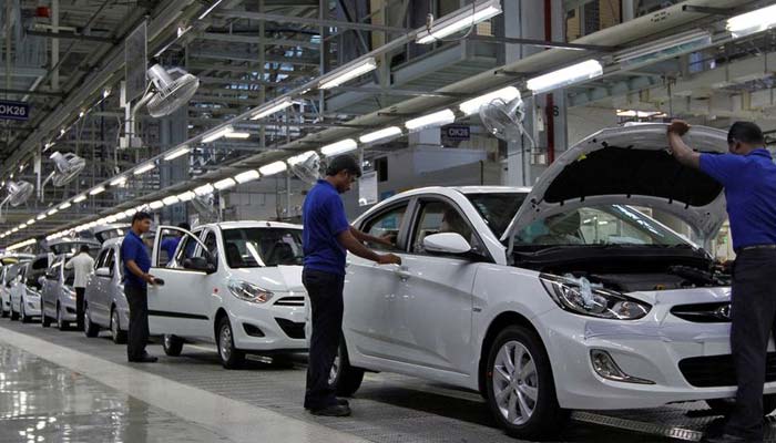 Workers assemble cars inside the Hyundai Motor India Ltd. plant at Kancheepuram district in the southern Indian state of Tamil Nadu October 4, 2012. — Reuters/File