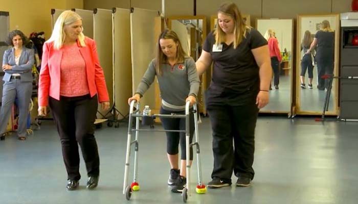 Spinal cord implant helps paralysed patients walk again.— AFP