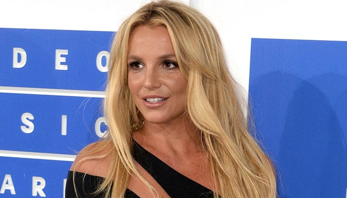 Britney Spears dances in high heels to tease what’s to come