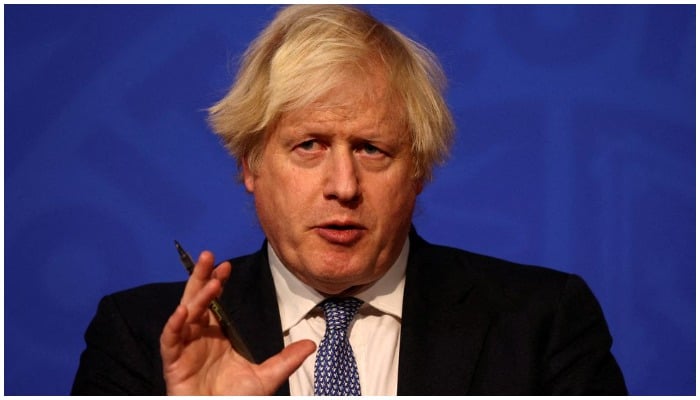 British Prime Minister Boris Johnson holds a news conference for the latest coronavirus disease (COVID-19) update in the Downing Street briefing room, in London, Britain December 8, 2021. Photo: Reuters/