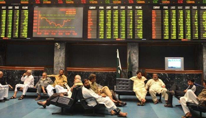 Investors and dealers and be seen sitting in the waiting lounge at the Pakistan Stock Exchange (PSX). — AFP/File