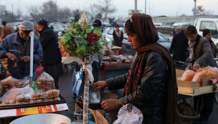 An Afghan salesman waits for customers in the center of Kabul, Afghanistan December 5, 2021. — Reuters