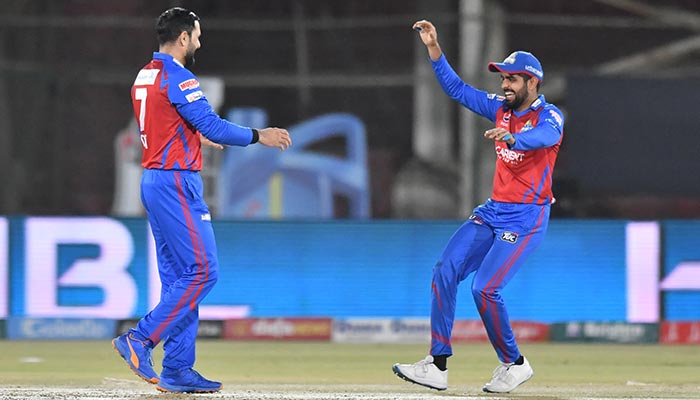 Karachi Kings skipper Babar Azam (right) celebrates with Mohammad Nabi during the match against Islamabad United at National Stadium, Karachi, on February 6, 2022. — PCB