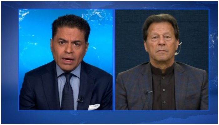 Prime Minister Imran Khan (L) speaking to CNNs Fareed Zakaria (R) about Pakistans diplomatic relations with Afghanistan — CNN screengrab via APP