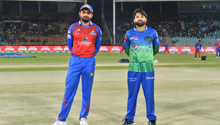 Karachi Kings skipper Babar Azam (L) and his Multan Sultans counterpart Mohammad Rizwan ahead of the toss on their first clash of the Pakistan Super League seventh edition at the National Stadium Karachi on January 27, 2022. — PCB/File