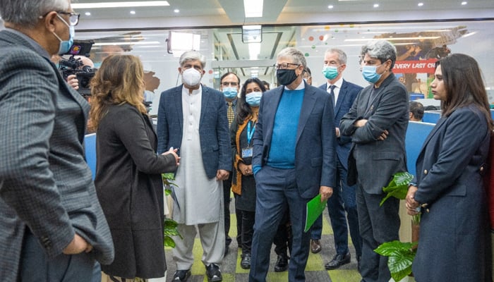 Microsoft co-founder and philanthropist Bill Gates interacts with officials at the National Emergency Operations Centre (NEOC) in Islamabad, on February 17, 2022. — NEOC