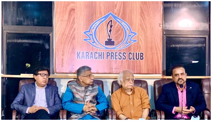 (Left to Right) President Karachi Press Club  Fazil Jamili, corporate leader, businessman and philanthropist Irfan Mustafa, legendary writer and painter Anwer Maqsood and artist Shahid Rassam during a press conference on The World Largest Gold Plated Quran at the Karachi Press Club. — Geo.tv