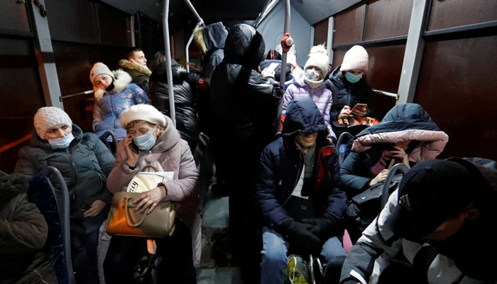 People are seen inside a bus arranged to evacuate local residents, in the rebel-controlled city of Donetsk, Ukraine February 18, 2022. — Reuters