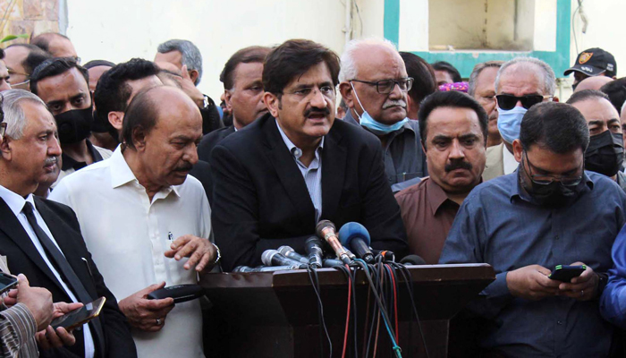 Sindh Chief Minister Murad Ali Shah along with Nisar Ahmed Khuhro, PPPs candidate for vacant Senate seat, addresses a press conference outside Election Commission of Pakistans office in Karachi. — PPI