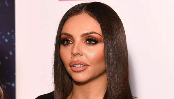 Jesy Nelson gets close to a model who was convicted for drug dealing